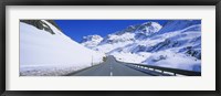 Framed Empty road passing through a polar landscape, Route 3, Graubunden, Switzerland