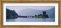 Framed Castle at the lakeside, Eilean Donan Castle, Loch Duich, Highlands Region, Scotland