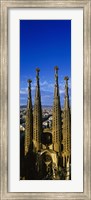 Framed High Section View Of Towers Of A Basilica, Sagrada Familia, Barcelona, Catalonia, Spain
