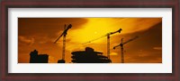 Framed Silhouette of cranes at a construction site, London, England