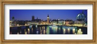 Framed Buildings lit up at dusk, Big Ben, Houses Of Parliament, Thames River, London, England