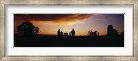 Framed Silhouette of statues of soldiers and cannons in a field, Gettysburg National Military Park, Pennsylvania, USA
