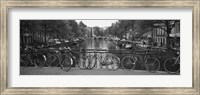 Framed Bicycle Leaning Against A Metal Railing On A Bridge, Amsterdam, Netherlands