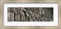 Framed Low angle view of statues carved on wall of a cathedral, Trondheim, Norway