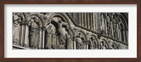 Framed Low angle view of statues carved on wall of a cathedral, Trondheim, Norway