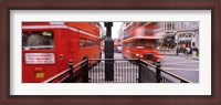 Framed Double-Decker buses on the road, Oxford Circus, London, England