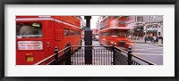 Framed Double-Decker buses on the road, Oxford Circus, London, England