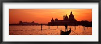 Framed Silhouette of a person on a gondola with a church in background, Santa Maria Della Salute, Grand Canal, Venice, Italy