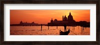 Framed Silhouette of a person on a gondola with a church in background, Santa Maria Della Salute, Grand Canal, Venice, Italy