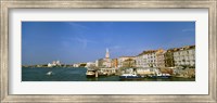 Framed Buildings along a canal with a church in the background, Santa Maria Della Salute, Grand Canal, Venice, Italy