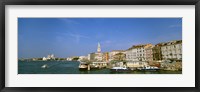 Framed Buildings along a canal with a church in the background, Santa Maria Della Salute, Grand Canal, Venice, Italy