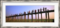 Framed Myanmar, Mandalay, U Bein Bridge, People crossing over the bridge