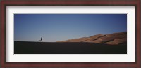 Framed USA, Colorado, Great Sand Dunes National Monument, Runner jogging in the park