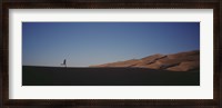 Framed USA, Colorado, Great Sand Dunes National Monument, Runner jogging in the park