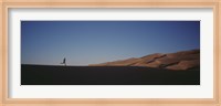 Framed USA, Colorado, Great Sand Dunes National Monument, Runner jogging in the park