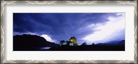Framed Low Angle View Of A Castle Lit Up At Dusk, Eilean Donan Castle, Highlands, Scotland, United Kingdom