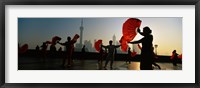 Framed Silhouette Of A Group Of People Dancing In Front Of Pudong, The Bund, Shanghai, China