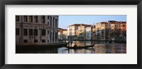 Framed Man on a gondola in a canal, Grand Canal, Venice, Italy