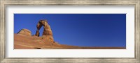 Framed Low angle view of a natural arch, Delicate arch, Arches National Park, Utah, USA