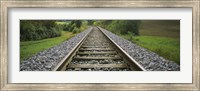 Framed Railroad track passing through a landscape, Germany