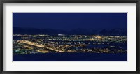 Framed High angle view of city lit up at night, Reykjavik, Iceland