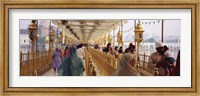 Framed Group of people walking on a bridge over a pond, Golden Temple, Amritsar, Punjab, India