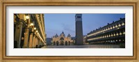 Framed Cathedral lit up at dusk, St. Mark's Cathedral, St. Mark's Square, Venice, Veneto, Italy