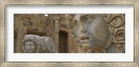 Framed Close-up of statues in an old ruined building, Leptis Magna, Libya