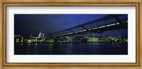 Framed Low angle view of a bridge across a river, Millennium Bridge, Thames River, London, England