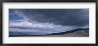 Framed Storm clouds over a desert, Inyo Mountain Range, California