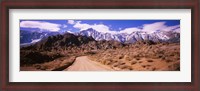 Framed Dirt road passing through an arid landscape, Lone Pine, Californian Sierra Nevada, California, USA