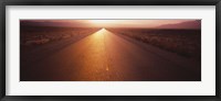 Framed Road passing through a desert, Nevada, USA