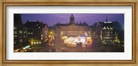 Framed High angle view of a town square lit up at dusk, Dam Square, Amsterdam, Netherlands