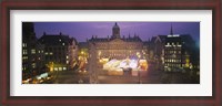 Framed High angle view of a town square lit up at dusk, Dam Square, Amsterdam, Netherlands