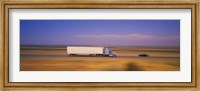 Framed Truck and a car moving on a highway, Highway 5, California, USA
