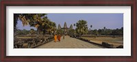 Framed Two monks walking in front of an old temple, Angkor Wat, Siem Reap, Cambodia