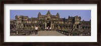 Framed Tourists walking in front of an old temple, Angkor Wat, Siem Reap, Cambodia