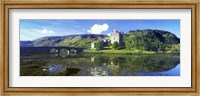 Framed Reflection of a castle and a mountain in water, Eilean Donan Castle, Loch Duich, Scotland