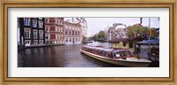 Framed Tourboat in a channel, Amsterdam, Netherlands