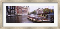 Framed Tourboat in a channel, Amsterdam, Netherlands