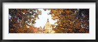 Framed Low angle view of buildings viewed through trees, Bietigheim, Baden-Wurttemberg, Germany