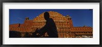 Framed Silhouette of a person riding a motorcycle in front of a palace, Hawa Mahal, Jaipur, Rajasthan, India