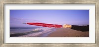 Framed Close-up of a woman's hand pointing with a red umbrella, Point Reyes National Seashore, California, USA