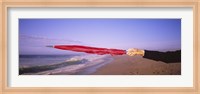 Framed Close-up of a woman's hand pointing with a red umbrella, Point Reyes National Seashore, California, USA