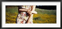 Framed Mid section view of a girl hugging her mother in a field, Marin County, California, USA
