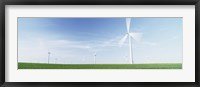 Framed Wind turbines in a field, Easington, Holderness, East Yorkshire, England