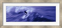 Framed High angle view of a person surfing in the sea, USA