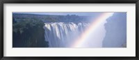 Framed Rainbow over a waterfall, Victoria Falls, Zambezi River, Zimbabwe