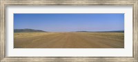 Framed Dirt road passing through a landscape, Masai Mara National Reserve, Great Rift Valley, Kenya