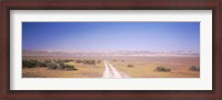 Framed Dirt road passing through a landscape, Carrizo Plain, San Luis Obispo County, California, USA